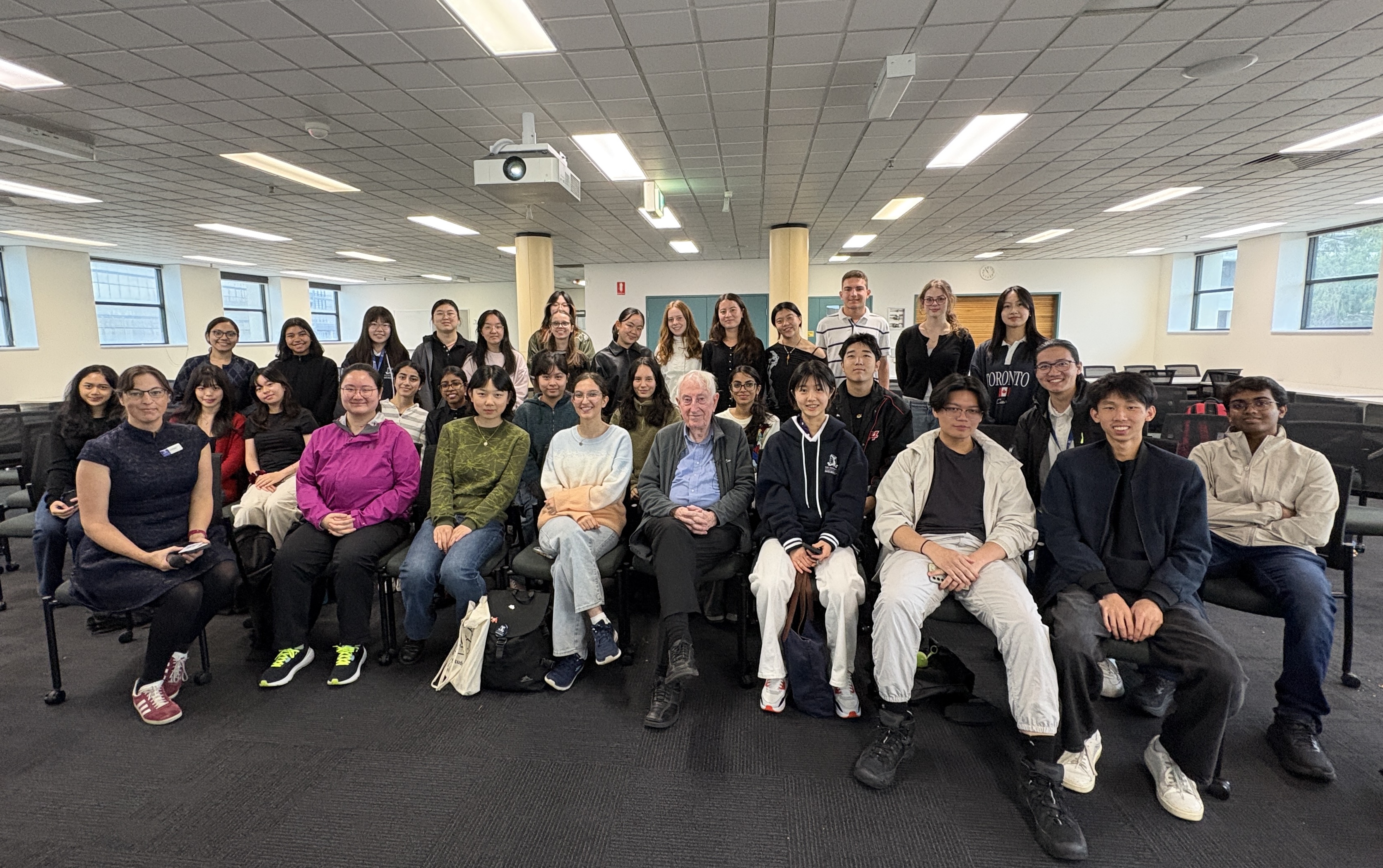 group of university students in classroom