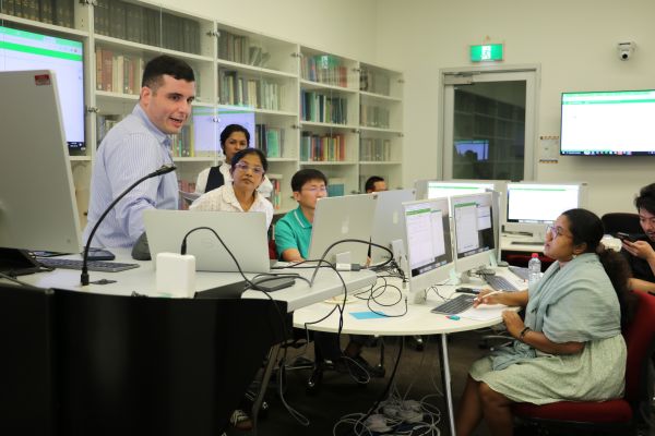Scientists learning about computer programming