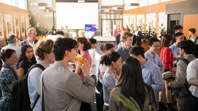 people mingle at function indoors