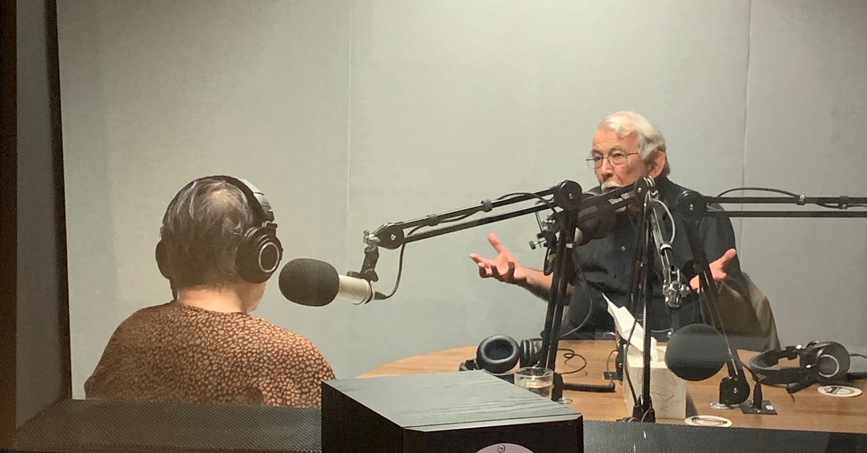 Photo of Sir Professor Thomas Blundell recording the 'Eavesdrop on Experts' podcast with Dr Andi Horvath