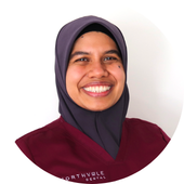 woman wearing headscarf smiling